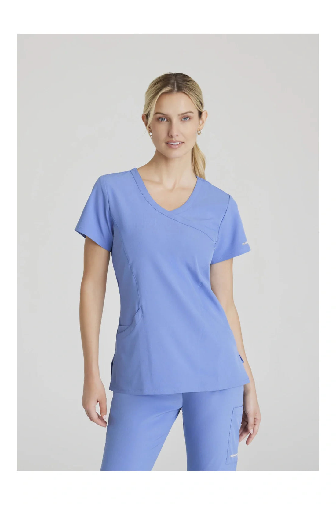 TOP MUJER SKECHERS SKECHERS SK102 - AZUL CIELO
