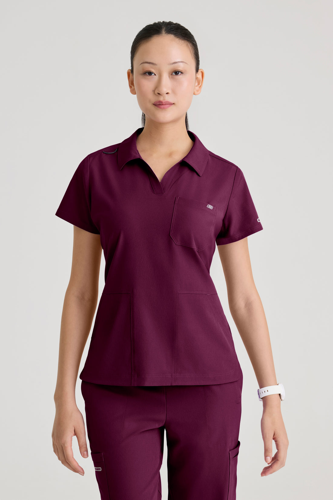 TOP MUJER SKECHERS SKT302 - VINOTINTO