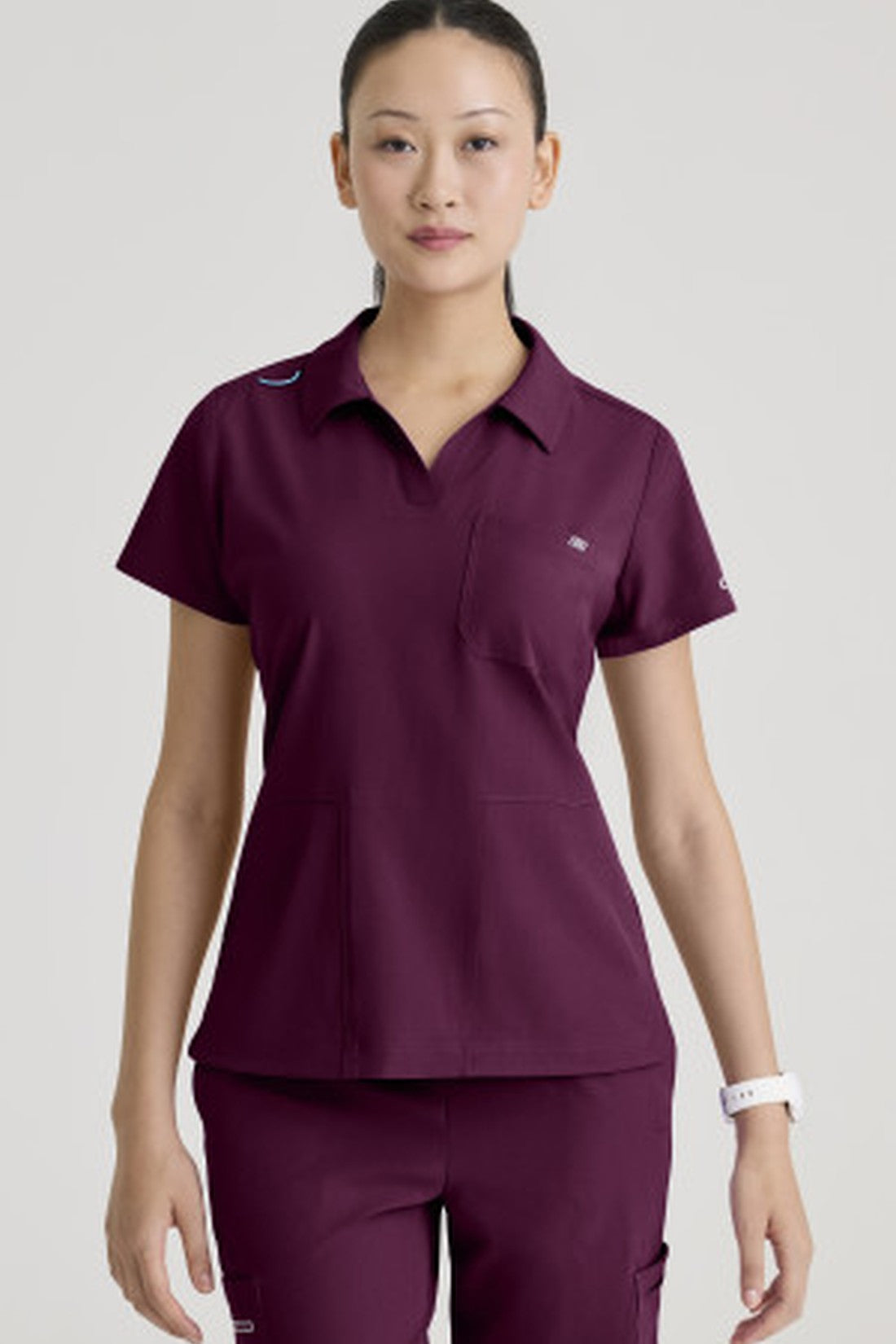 TOP MUJER SKECHERS SKECHERS SKT302 - VINOTINTO