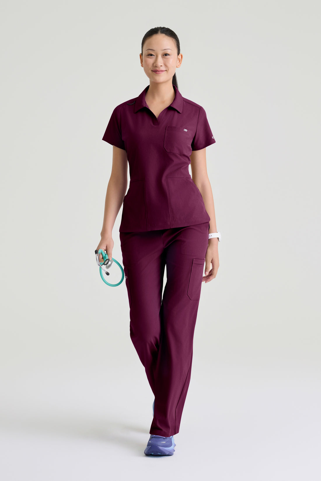 TOP MUJER SKECHERS SKT302 - VINOTINTO
